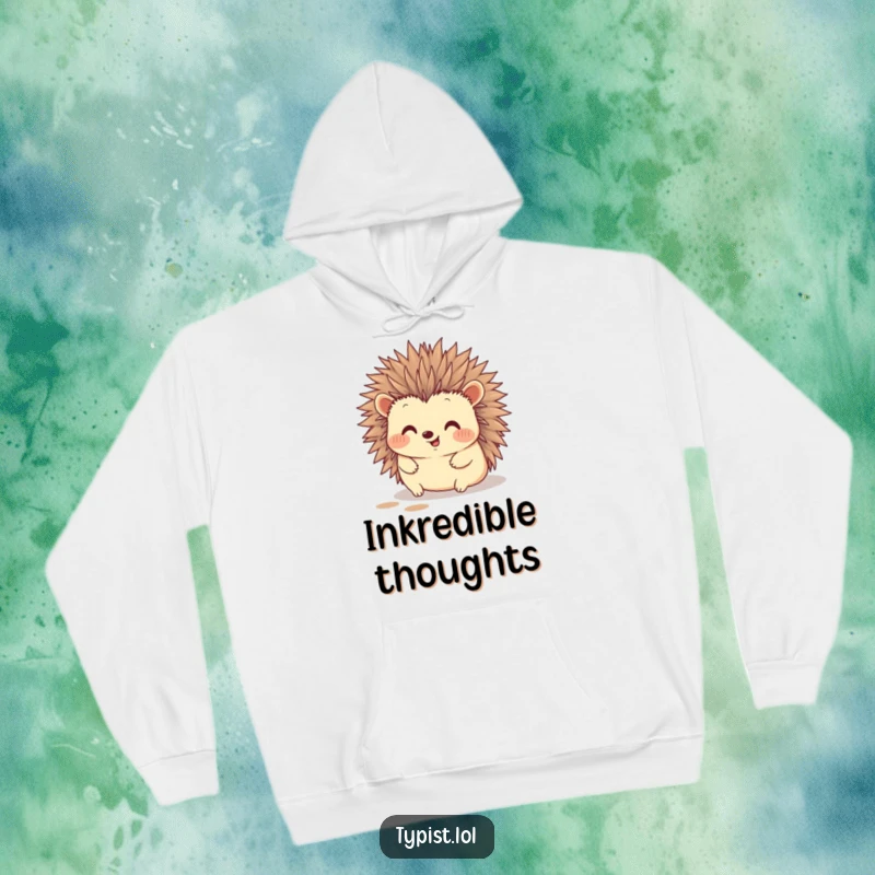Funny hedgehog hoodie showcasing a happy hedgehog typing with its quills, leaving ink marks, a cozy and humorous design.