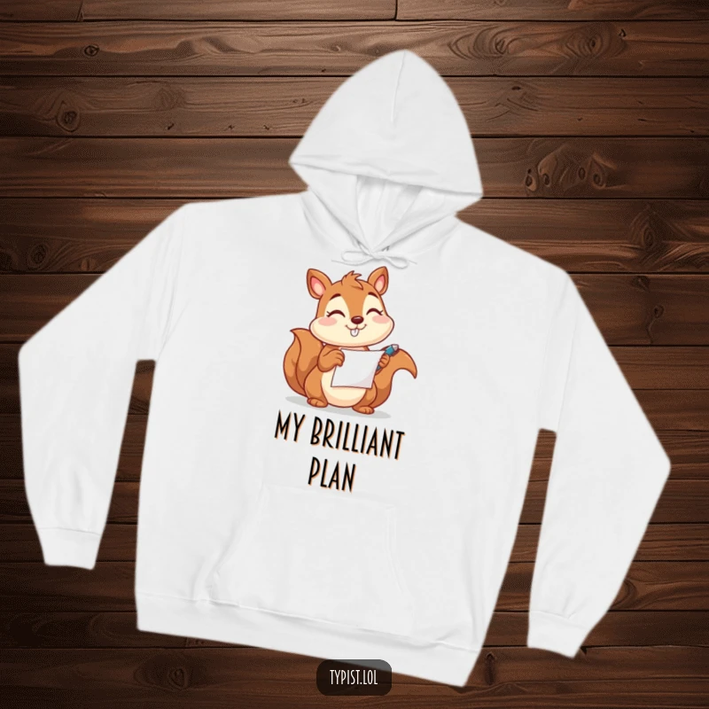 Funny hoodie featuring a happy squirrel with a pen and paper, winking playfully, designed for cozy creativity and humor.