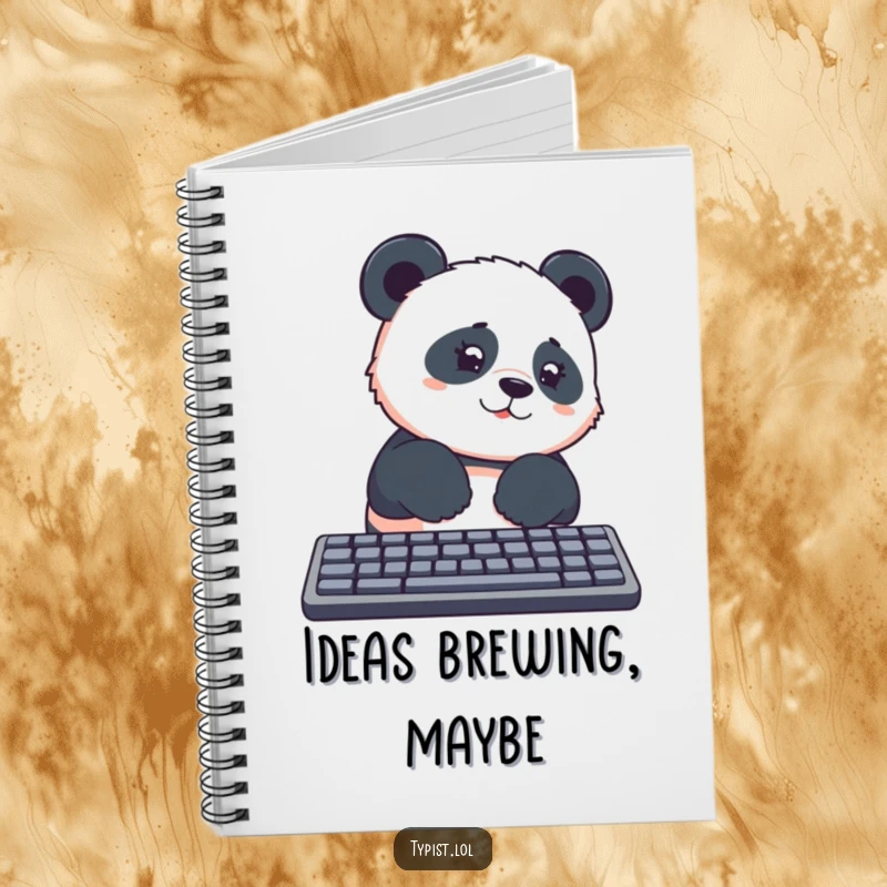 Funny panda with curious expression, paws on a keyboard, ready to type, on a notebook cover, great funny gift.