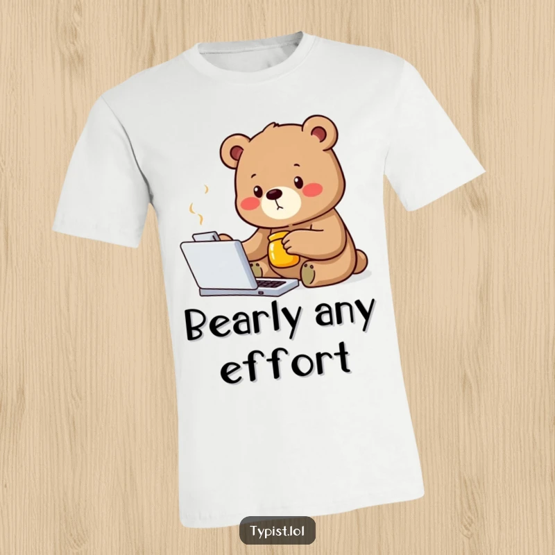 Funny bear t-shirt featuring a determined bear typing with one paw, holding a honey jar, representing focus and reward.