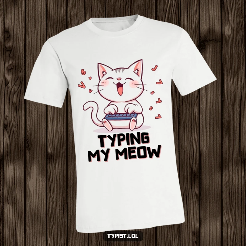 Funny t-shirt depicting a delighted cat typing with extreme speed, letters flying, capturing the chaos of creative inspiration.