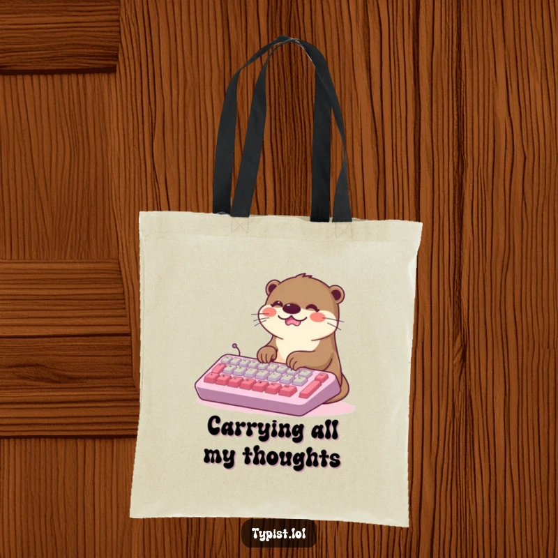Funny Kawaii Otter Tote Bag: A happy otter types rapidly on a huge keyboard, bringing smiles. Practical and humorous everyday bag.
